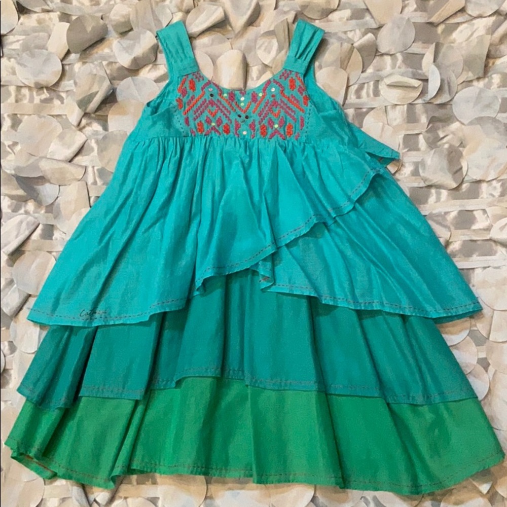 Adorable Asymmetrical tiered dress for girls.